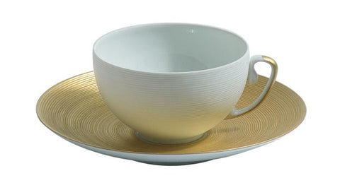 Hemisphere gold cup and saucer