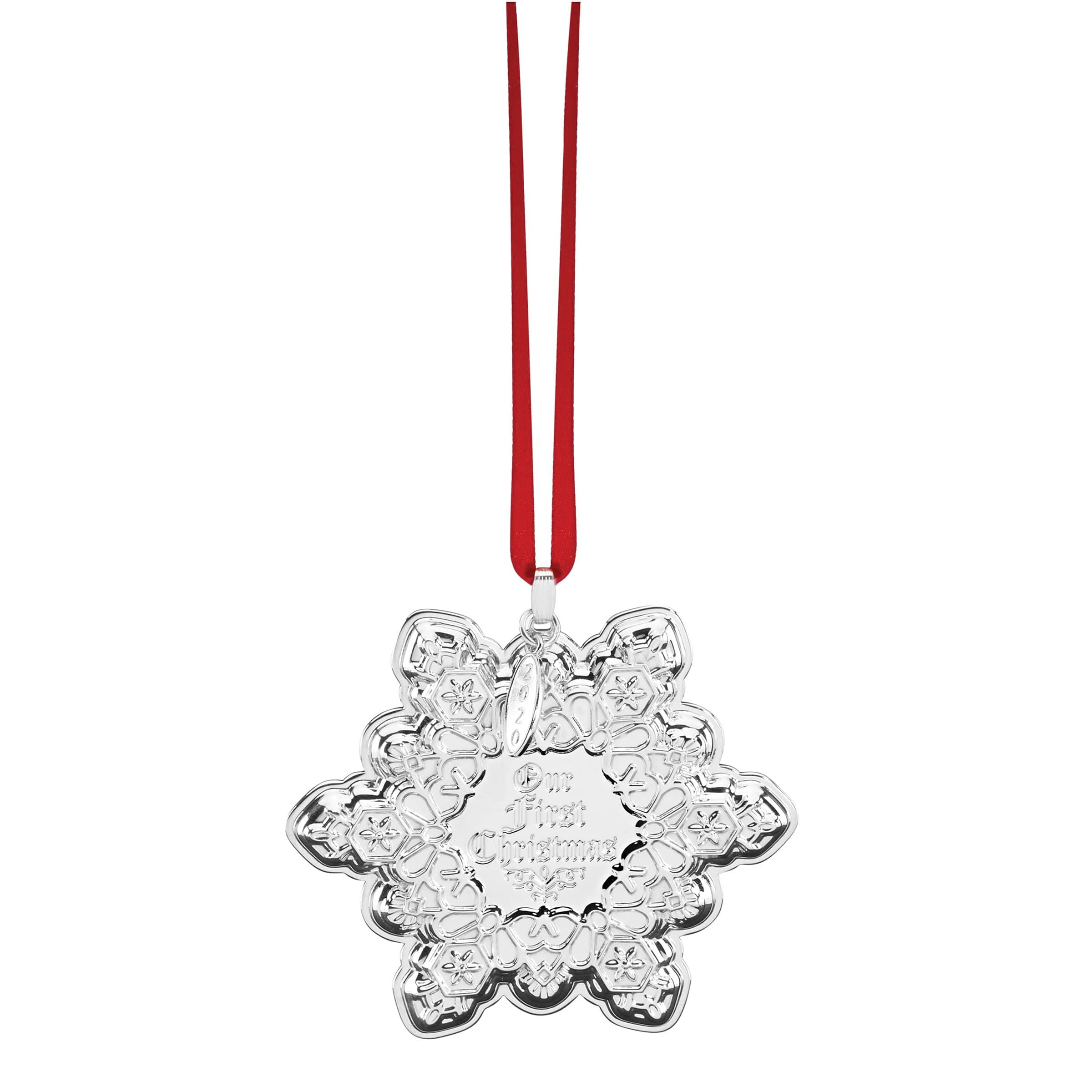Celebrate your first holiday together with this sterling silver snowflake ornament featuring intricate designs, an "Our First Christmas" message and an exclusive 2020 hangtag to commemorate the year.