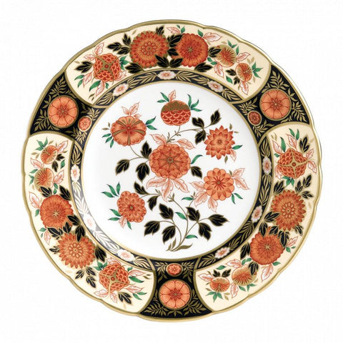 Inspired by the traditional Imari pattern that has become synonymous with Royal Crown Derby over the years, each plate is a unique take on a classic pattern. Mix and match with your existing dinnerware for an impressive array of handmade porcelain. Each plate is handfinished with 22k gold.  Measures 8½" d.