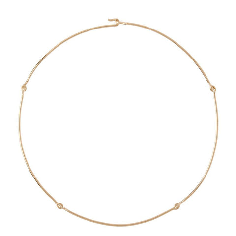 Simple and elegant 18k gold wire collars that can be worn alone or beautifully embellished with charms