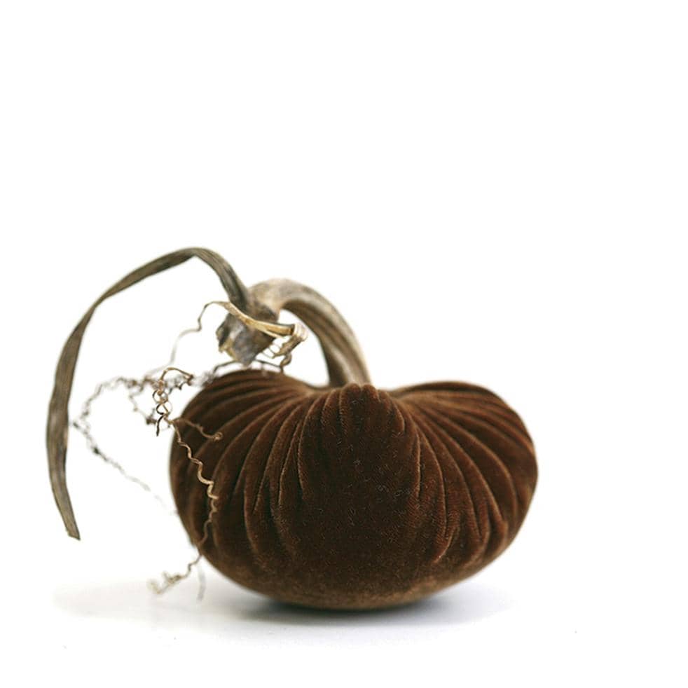 Every original plush pumpkin product is meticulously hand-crafted and one-of-a-kind, designed to add the perfect accessory to your home. We use real pumpkin, gourd and squash stems, harvested by hand from local farms.