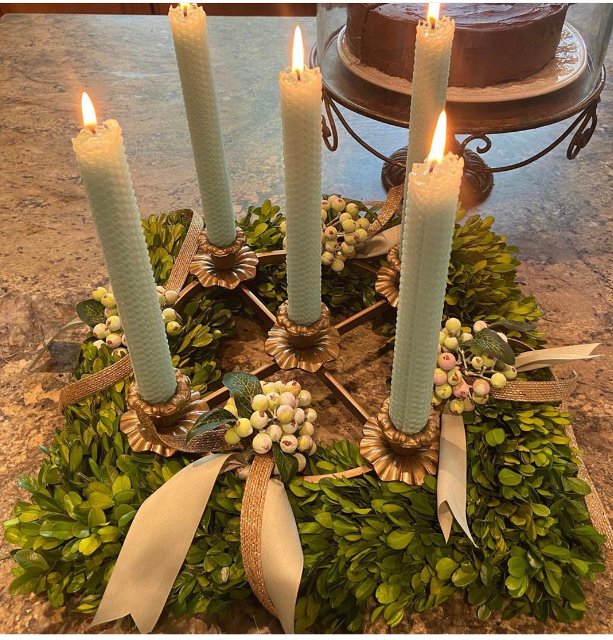 Complete your Advent centerpiece with this sturdy ring that holds our 8” tapers (7/8” diameter) perfectly. The piece measures a total of 12” across and has 4 taper “cups” with bobeches attached to the outer edge of the ring, and 1 attached in the center of the middle cross.