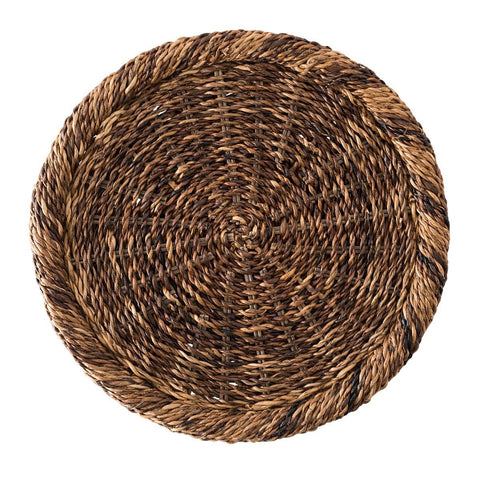 Tightly hand-woven rustic fibers create a rustically handsome charger that makes a quiet statement.